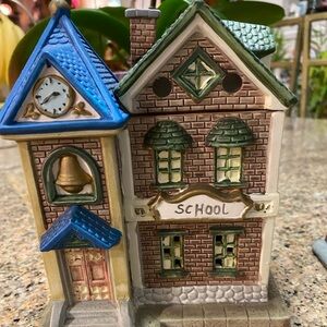 Charming Schoolhouse and General Store figurines.